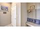 Functional entryway with a built-in bench, hat rack, and decor at 4820 Se Clifftop Dr, Pahrump, NV 89061