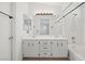 Bathroom with double sinks, large mirror and tub/shower combo at 51 Belle Point Ave, Las Vegas, NV 89123