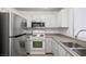 Functional kitchen with stainless steel appliances and ample counter space at 51 Belle Point Ave, Las Vegas, NV 89123