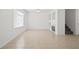 Open living room featuring tile flooring, a fireplace, and a ceiling fan at 51 Belle Point Ave, Las Vegas, NV 89123