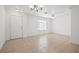 Spacious living room with tile flooring, a ceiling fan, and ample natural light at 51 Belle Point Ave, Las Vegas, NV 89123