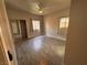 Bedroom showcasing wood floors, natural lighting, and a sliding door closet at 5150 S Jones Blvd # 105, Las Vegas, NV 89118