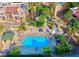 Aerial view of the community pool, spa, outdoor kitchen, and lounge area at 5150 S Jones Blvd # 105, Las Vegas, NV 89118