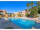 Relaxing community pool with lounge chairs and lush landscaping at 5150 S Jones Blvd # 105, Las Vegas, NV 89118