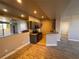 Open kitchen with granite counters, grey cabinets, and stainless steel appliances at 5150 S Jones Blvd # 105, Las Vegas, NV 89118