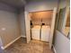 Laundry closet features washer and dryer with bi-fold doors at 5150 S Jones Blvd # 105, Las Vegas, NV 89118