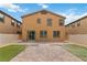 A home's exterior features sliding glass doors to the backyard, perfect for indoor/outdoor living at 5317 Golden Melody Ln, North Las Vegas, NV 89081
