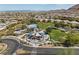 Aerial view of neighborhood park with playground, splashpad, and picnic area at 5594 Trilling Bird Dr, Las Vegas, NV 89135
