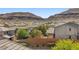 Tranquil view of houses against the backdrop of desert mountains, enhancing the community's serene appeal at 5594 Trilling Bird Dr, Las Vegas, NV 89135