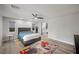 This bedroom offers lots of space, a ceiling fan, and lots of natural light at 5594 Trilling Bird Dr, Las Vegas, NV 89135