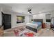 Comfortable bedroom with natural light and a view of the backyard pool area at 5594 Trilling Bird Dr, Las Vegas, NV 89135