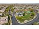 Aerial view of the community park featuring a pool, playground, and walking path at 5594 Trilling Bird Dr, Las Vegas, NV 89135