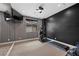 Personal exercise room with modern equipment, mirrored wall, and sleek design for a home workout space at 5594 Trilling Bird Dr, Las Vegas, NV 89135