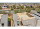 A rooftop view of a modern home with a patio and lush landscaping at 5594 Trilling Bird Dr, Las Vegas, NV 89135