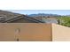 Neutral exterior with mountain views creates a picturesque backdrop for a serene living environment at 5594 Trilling Bird Dr, Las Vegas, NV 89135