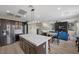 Spacious kitchen featuring stainless steel appliances and dark wood cabinetry at 5594 Trilling Bird Dr, Las Vegas, NV 89135