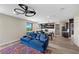 Open-concept living room seamlessly connects to the kitchen and dining area at 5594 Trilling Bird Dr, Las Vegas, NV 89135