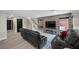 Living room with plush seating, fireplace and access to the upper level at 5594 Trilling Bird Dr, Las Vegas, NV 89135