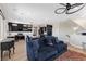 Open-concept living area seamlessly connecting the kitchen and living room, perfect for modern living at 5594 Trilling Bird Dr, Las Vegas, NV 89135