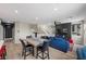 Open-concept living space with seamlessly connected kitchen, dining, and living areas at 5594 Trilling Bird Dr, Las Vegas, NV 89135