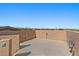 Spacious rooftop patio boasting desert views and stucco perimeter walls at 5594 Trilling Bird Dr, Las Vegas, NV 89135
