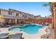 Backyard features a sparkling pool, spa, and lounge area, great for outdoor living at 5594 Trilling Bird Dr, Las Vegas, NV 89135