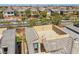 View of a roof deck with surrounding neighborhood and mountain views at 5594 Trilling Bird Dr, Las Vegas, NV 89135