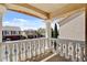 View from balcony with decorative balusters overlooking neighborhood homes on a sunny day at 6236 Mount Palomar Ave, Las Vegas, NV 89139