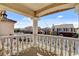 Balcony view of neighborhood with homes and decorative balusters on a sunny day at 6236 Mount Palomar Ave, Las Vegas, NV 89139