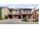 Charming two-story home with a landscaped yard and a three-car garage at 6236 Mount Palomar Ave, Las Vegas, NV 89139