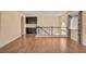 Spacious living room boasts hardwood floors, natural light, and a sleek built-in cabinet at 6236 Mount Palomar Ave, Las Vegas, NV 89139
