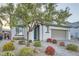 Charming single-story home with desert landscaping, a brick driveway, and a welcoming front entrance at 6445 N Alpine Ridge Way, Las Vegas, NV 89149