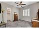 Bright bedroom showcases modern shutters and a mirrored bureau beside a closet with ample storage at 7095 Falabella Ridge Ave, Las Vegas, NV 89131