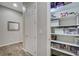 Pantry with abundant shelving offers ample space for storage of dry goods and household essentials at 7095 Falabella Ridge Ave, Las Vegas, NV 89131