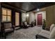 Inviting covered patio with comfortable seating and stylish decor, perfect for relaxing outdoors at 7095 Falabella Ridge Ave, Las Vegas, NV 89131