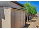 A storage shed with neutral color and double door, ideal for storing outdoor equipment and tools at 7095 Falabella Ridge Ave, Las Vegas, NV 89131