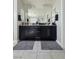 Modern bathroom with double vanity, generous counter space and stylish fixtures at 7114 Superstar St, North Las Vegas, NV 89084