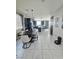 Open-concept dining area with modern lighting and neutral decor at 7114 Superstar St, North Las Vegas, NV 89084