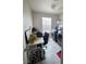 Bright laundry room with tile floors, modern appliances, and a functional workspace at 7114 Superstar St, North Las Vegas, NV 89084