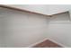 Walk-in closet featuring carpet flooring with white walls, shelving and a rail for hanging clothes at 7116 Wonderberry St, Las Vegas, NV 89131