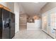 Open floor plan showing kitchen and a view of the living area at 7116 Wonderberry St, Las Vegas, NV 89131