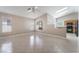 Open living area with tile flooring, natural light, and kitchen views at 7116 Wonderberry St, Las Vegas, NV 89131