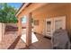 Cozy covered patio featuring a concrete floor and access to a gravel backyard, great for relaxing outdoors at 7116 Wonderberry St, Las Vegas, NV 89131