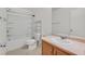 Well-organized bathroom with vanity, shower, toilet, and storage shelving at 7173 Las Colinas Ave, Las Vegas, NV 89179