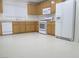 Spacious kitchen featuring white appliances and light-toned cabinets at 7173 Las Colinas Ave, Las Vegas, NV 89179