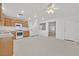 Well-lit kitchen featuring modern appliances, ample counter space, and a view to the open-concept living area at 7173 Las Colinas Ave, Las Vegas, NV 89179