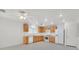 Bright kitchen with white appliances, plenty of cabinet space, and natural light at 7173 Las Colinas Ave, Las Vegas, NV 89179