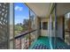 Balcony showcasing the city view, green carpet and sliding glass doors at 725 N Royal Crest Cir # 246, Las Vegas, NV 89169