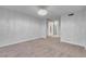 This bedroom features neutral carpeting and a mirrored closet at 725 N Royal Crest Cir # 246, Las Vegas, NV 89169