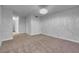 This bedroom features neutral carpeting and a closet at 725 N Royal Crest Cir # 246, Las Vegas, NV 89169